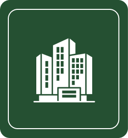 Icon of multiple white buildings on a dark green background, enclosed in a rectangular border.